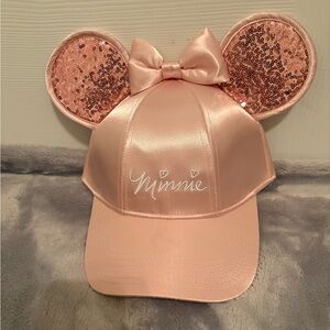 Adult Disney Minnie mouse satin hat with sequin ears and a bow. New with tags